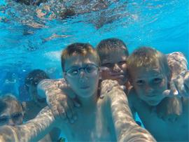 Children swimming underwater
